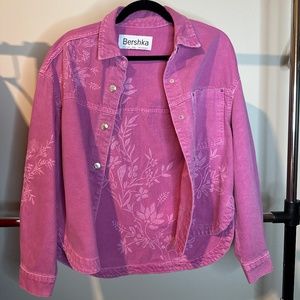 Pink jean jacket with flower print